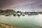 Beautiful composition view of Malaysian Harbour with a yatch during sunset