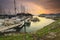 Beautiful composition view of Malaysian Harbour with a yatch during sunset