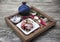 Beautiful composition of wooden trays, tapas, hot red pepper, jar with olive oil, garlic. Great background for restaurant, cafe