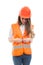 Beautiful construction worker girl buttoning her vest