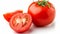 The Beautiful Contrast: Vibrant Whole Red Tomato and Slice on a White Background