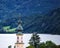 Beautiful copper church spire on the shore of Lake Wolfgangsee in Austria