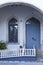 Beautiful corner of doorway and windows with arch and plants St. Lazarus church