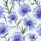 Beautiful cornflowers in vintage style with leaves close-up as a background.