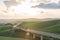 Beautiful countryside landscapes in Tuscany with rolling hills during the sunset