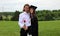 Beautiful couple and girl in black Cap, Gown and Tass, teenager. Unique gorgeous face, nice smile, wonderful eyes girl.