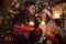 Beautiful couple lighting sparklers for christmas in front of a