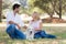 Beautiful couple with old senior labrador dog in the nature