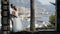 Beautiful couple on resort town background. Action. Wedding photo shoot of young couple on background of city located on