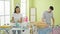 Beautiful couple\\\'s love shines in laundry chores, sparking joy in the laundry room, where man and woman express their