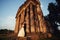 Beautiful couple in wedding dress outdoors near the victorian stone church