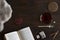 Beautiful cozily flat lay of cup of tea, book, sheepskin, cookie and spices