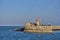 Beautiful creative evening view of red East Pier lighthouse in Dun Laoghaire harbor seen from West Pier, Dublin, Ireland