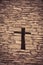 beautiful cross in stone bricks wall