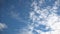 Beautiful cumulus clouds, illuminated by daytime sunlight.