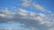 Beautiful Cumulus clouds move fast across the blue sky, Timelapse. Beauty of nature colors