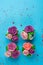 Beautiful cupcakes decorated with flower from colorful sweet