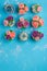 Beautiful cupcakes decorated with flower from colorful sweet