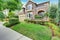 Beautiful curb appeal of American house with stone trim