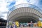 The beautiful curved design of shading roofing at the entrance of Sydney Olympic park train station.