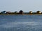 Beautiful cute little wooden beach huts summer houses, painted in lively colors, Aero Island, South Funen, Denmark