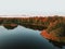 Beautiful Danish forest lake during autumn.