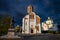 Beautiful dark blue thundercloud over the city. Monument to the founder of the city Yaroslav the Wise.