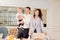 a beautiful dark-haired woman and man with a one-year-old boy at the banquet.