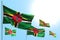 Beautiful day of flag 3d illustration - 5 flags of Dominica are waving against blue sky photo with soft focus