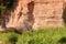 Beautiful day on the river, sandstone cliffs and tree reflections in the water, blue sky reflected in the river water