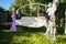 Beautiful decorated for wedding swing at backyard