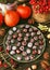 Beautiful decoration with hand painted chestnuts with different funny motifs in a pate for home or garten.