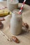 Beautiful decoration on table, fruits and vitamin beverage in glassy jar