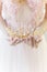 Beautiful delicate crown in the style of fine art at the hands of-girl bride