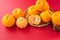 Beautiful and delicous tangerine isolated on airy blue background with bamboo sieve, new modern concept of chinese new year, close