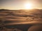 Beautiful desert and dunes view from above with sun and shadows on the sand - amazing nature outdoors and concept of beauty of the