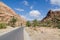 Beautiful deserted mountain landscape with road leading to horizon, Morocco, North Africa