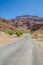 Beautiful deserted mountain landscape with road leading to horizon, Morocco, North Africa