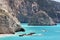 Beautiful detail of rocks with the sea of â€‹â€‹Porto Katsiki as a background