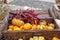 Beautiful and different varieties of squashes and pumpkins on rustic wooden box. Autumn rustic scene. Selective focus. Closeup