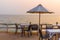 Beautiful dinner table setting on the beach