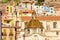 Beautiful dome on background of colorful buildings of Bosa, Sardinia, Italy