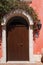 Beautiful door decorated with flowers in italy