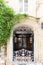 Beautiful doorway with decorations small gate and flowers