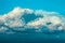 Beautiful dramatic clouds with blue sky background. Nature weather, panoramic cloud and sky background