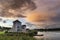 Beautiful dramatic clouds formation over lake landscape immediately prior to violent storm