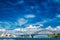 Beautiful dramatic cloudscape above the Sydney Opera House and Harbour bridge with cityscape views in sunshine day.