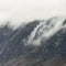 Beautiful dramatic Lake District landscape image of thick low cloud hanging over Illgill Head in wasdale Valley giving a very