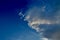 Beautiful and dramtic thunderstorm cloud formations hgih in the sky