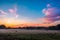 Beautiful dreamy sunrise on the farm land in the country